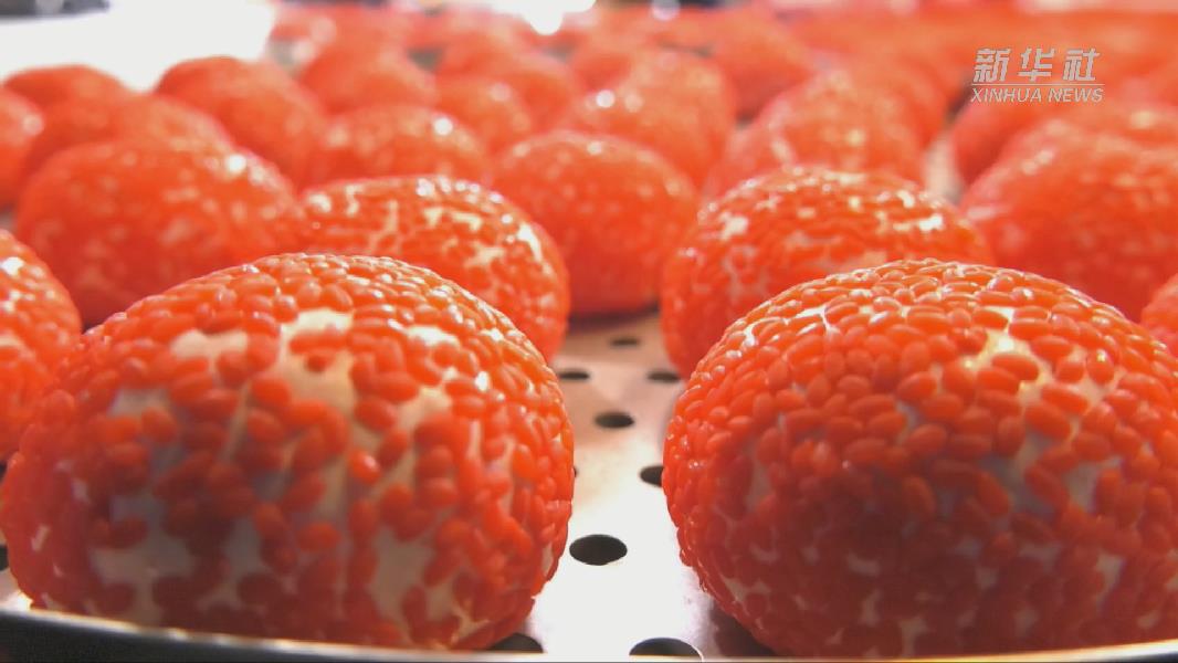 贵州侗乡吃红粑过新年